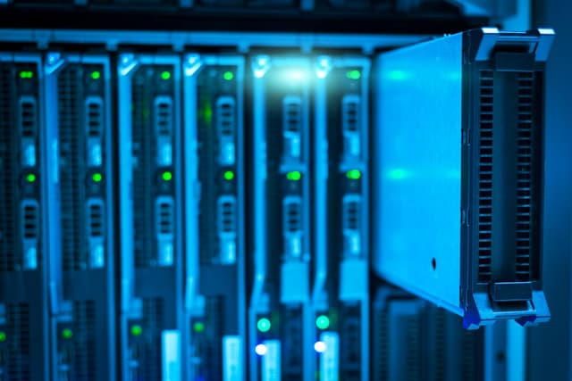 Server racks with glowing status lights in a data centre