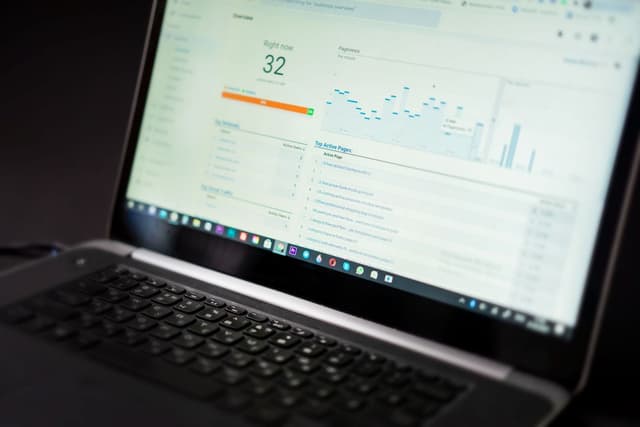 A laptop displaying an analytics dashboard