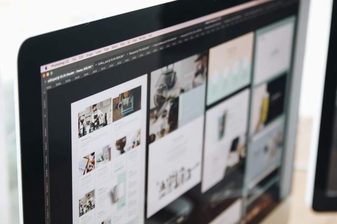 A monitor showing a website design layout